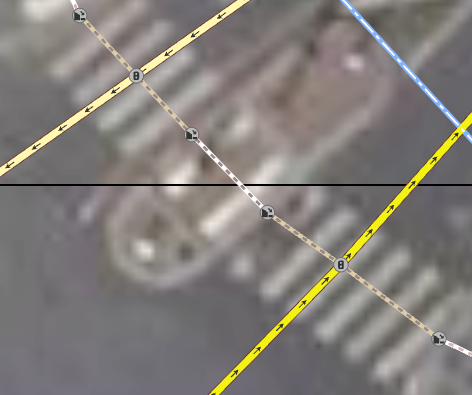 Screen capture of a perfectly mapped traffic island on OpenStreetMap.