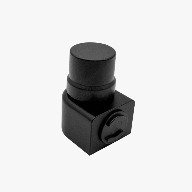 An image of an RTK receiver. The antenna and case are black and are approximately the size of a large match box.